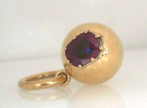 Single Stone 18k yellow gold pear shaped Ruby Luna charm 1.28tw