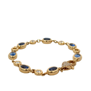 Erica Courtney 18k yellow gold bezel set diamond and blue sapphire bracelet