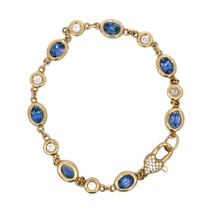 Erica Courtney 18k yellow gold bezel set diamond and blue sapphire bracelet